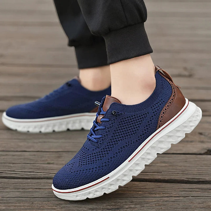 Indoor shot of unisex walking shoes, knit material, focusing on the cushioned insole for arch support