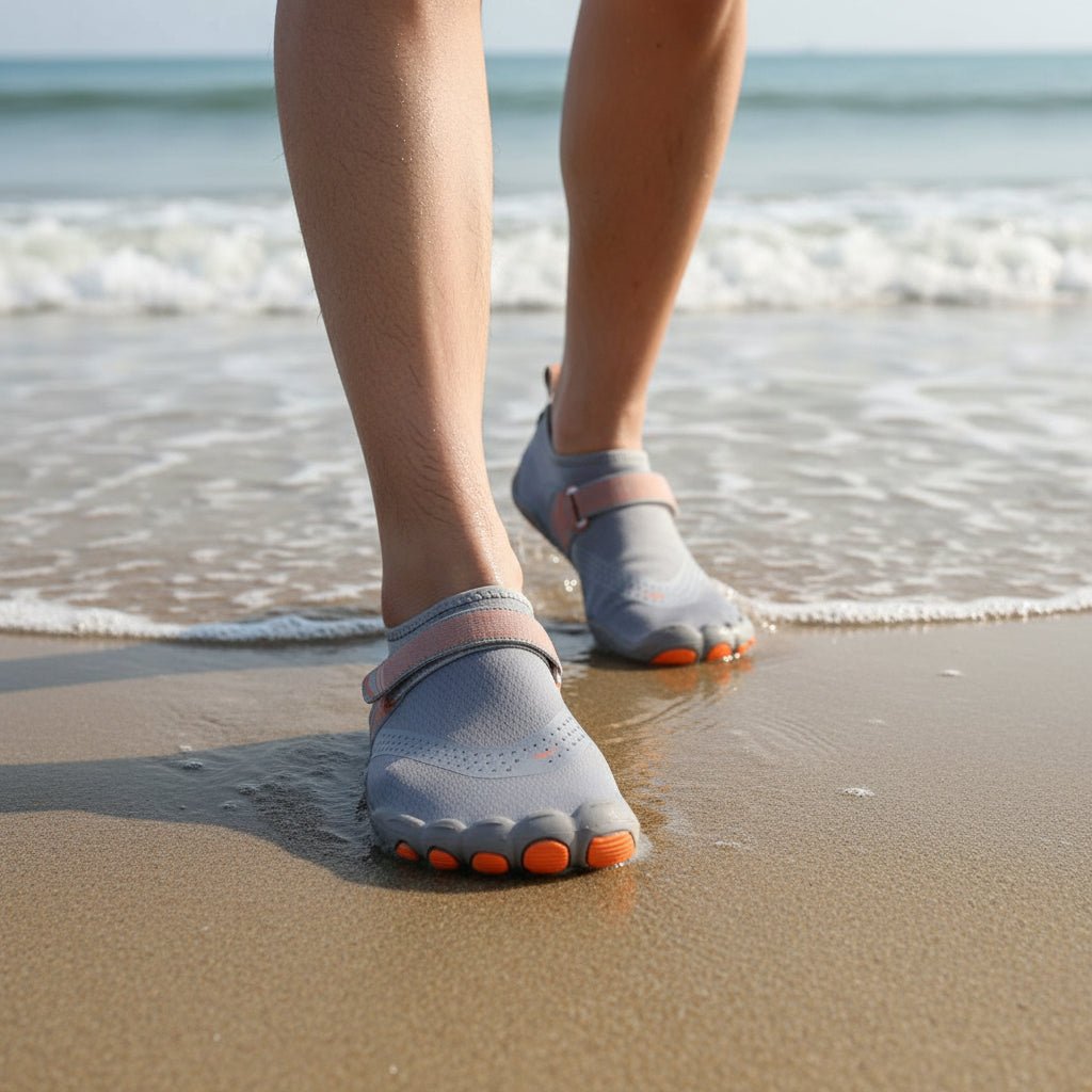 Barefoot water shoes in black, ideal for beach, swim & aqua sports. Lightweight, quick-dry & flexible summer footwear.