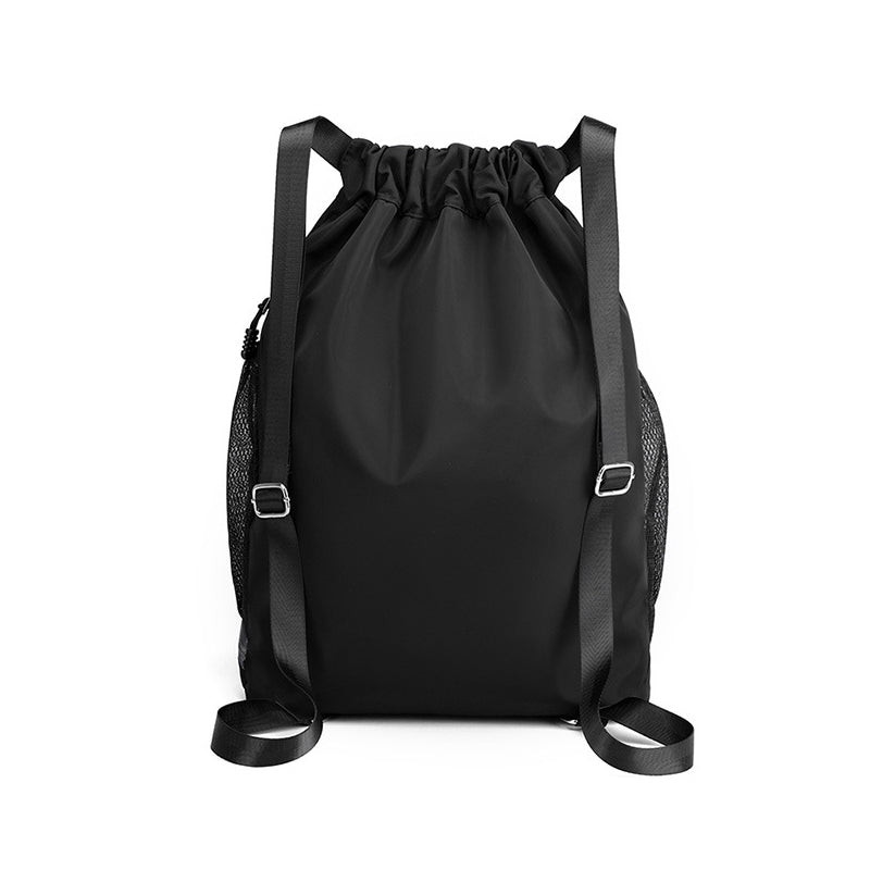Unisex travel-friendly black nylon drawstring backpack, lightweight and foldable.