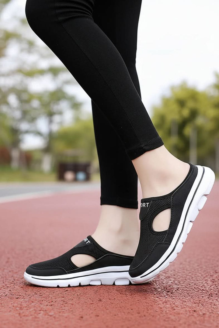 Cushioned unisex orthopedic slippers with arch support for cozy, breathable, lightweight comfort at home.