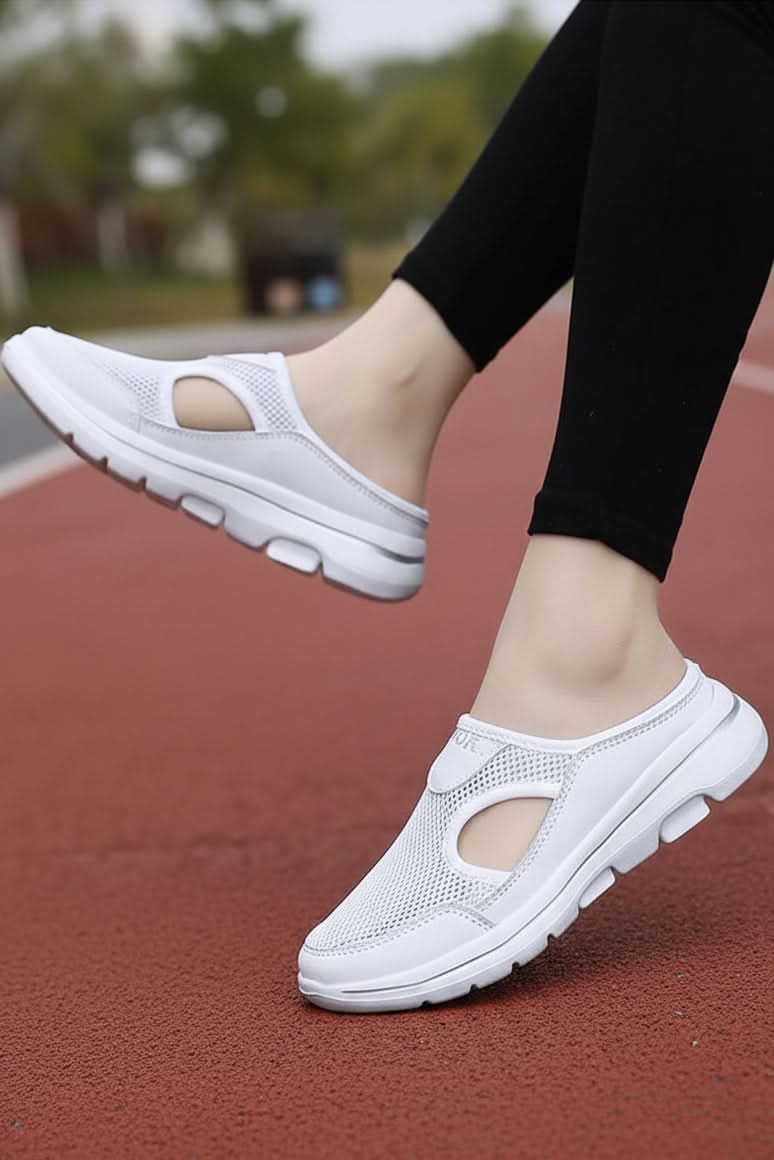 Soft, breathable unisex orthopedic indoor slippers providing lightweight comfort & support for happy feet.