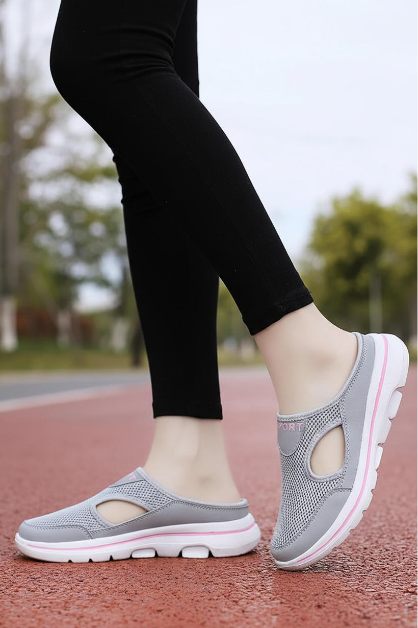 Supportive orthopedic unisex slippers, lightweight and cushioned for foot health & all-day comfort.