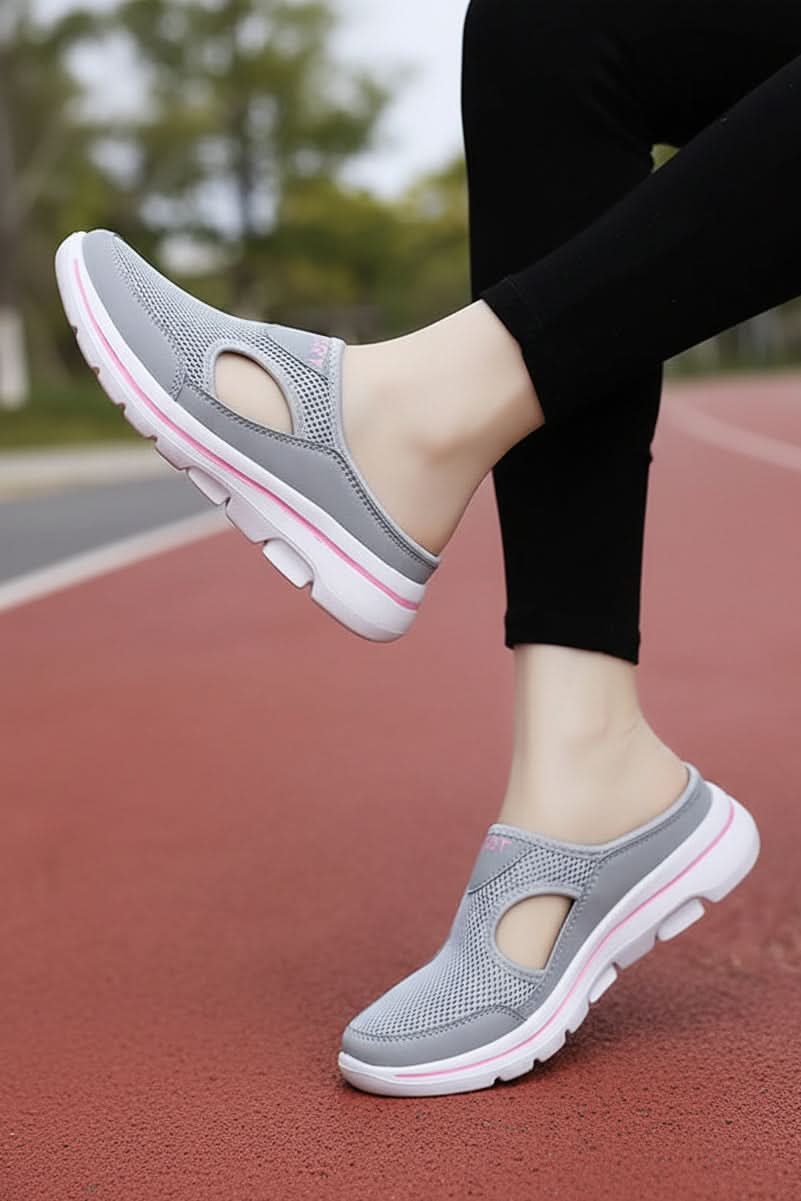 Breathable unisex orthopedic slippers for women & men, lightweight, cushioned, ensuring all-day comfort & support.