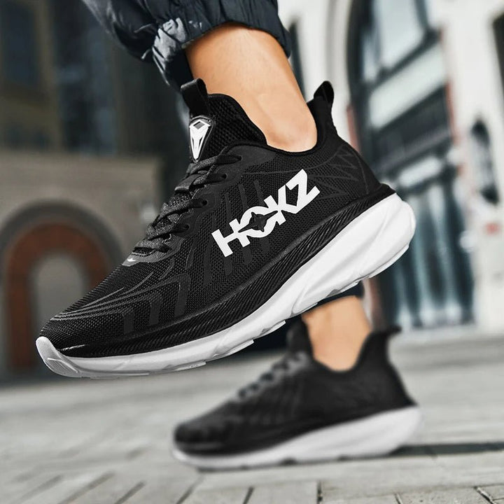 Rear view of supportive unisex training shoes, featuring ultimate comfort and stability for active use.