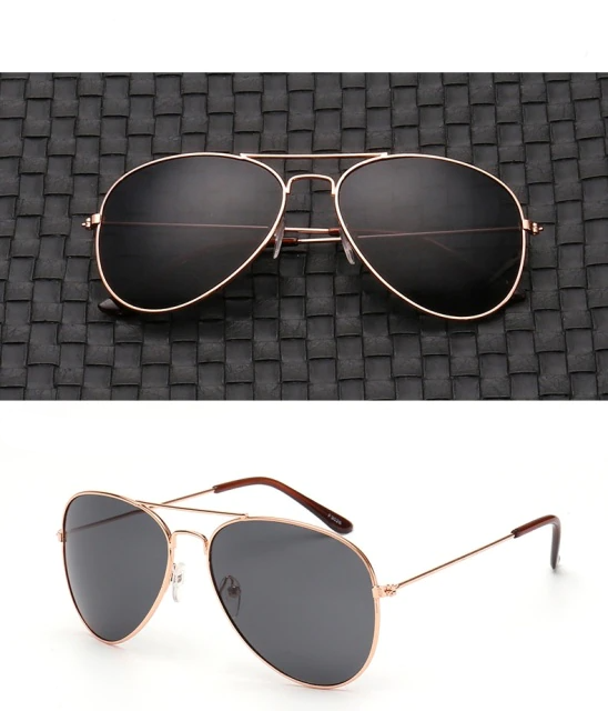 Fashionable unisex polarized aviator sunglasses. Essential eyewear for UV400 protection and outdoor glare reduction.
