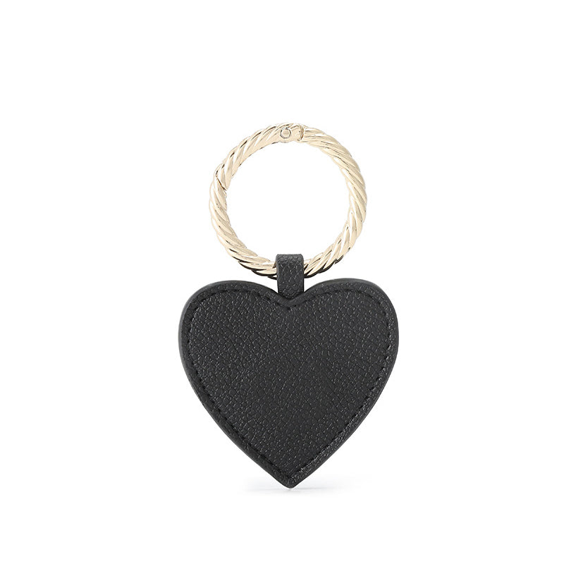 Unisex magnetic hat clip displayed alongside a passport and travel wallet.