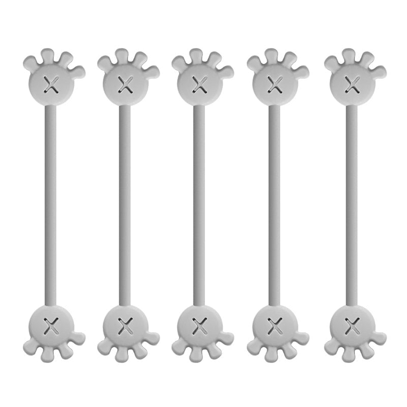 Magnetic silicone cable organizer clip, purple, effectively managing loose desktop charging cables.