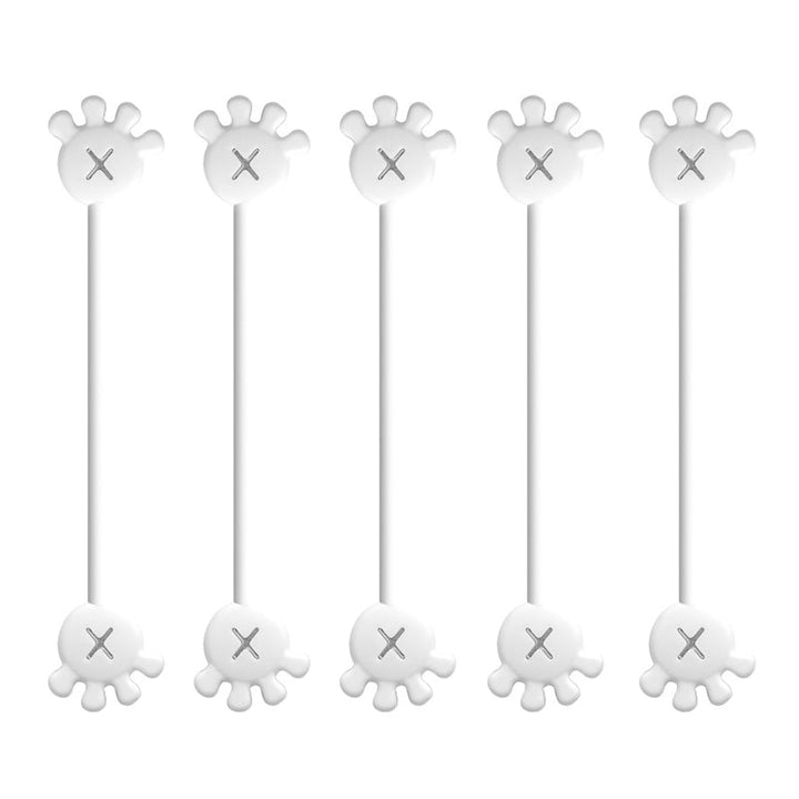 Magnetic silicone cable organizer clip, black, discreetly managing cables behind a TV setup.