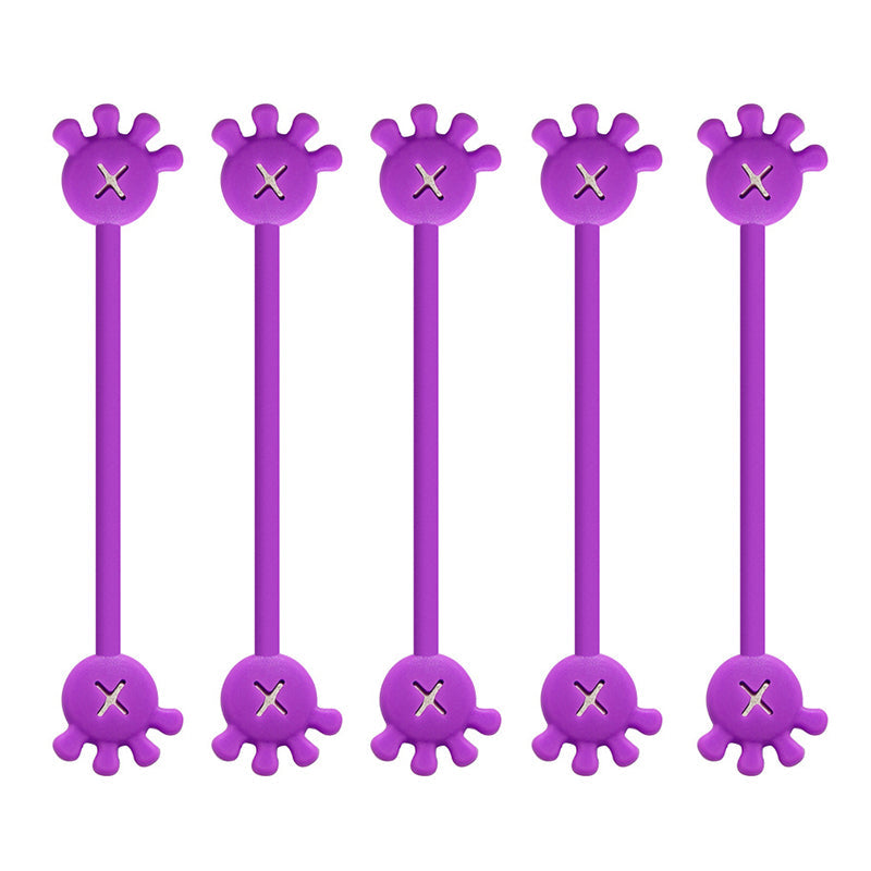 Magnetic silicone cable organizer clip, neutral beige, for understated and effective cord management.