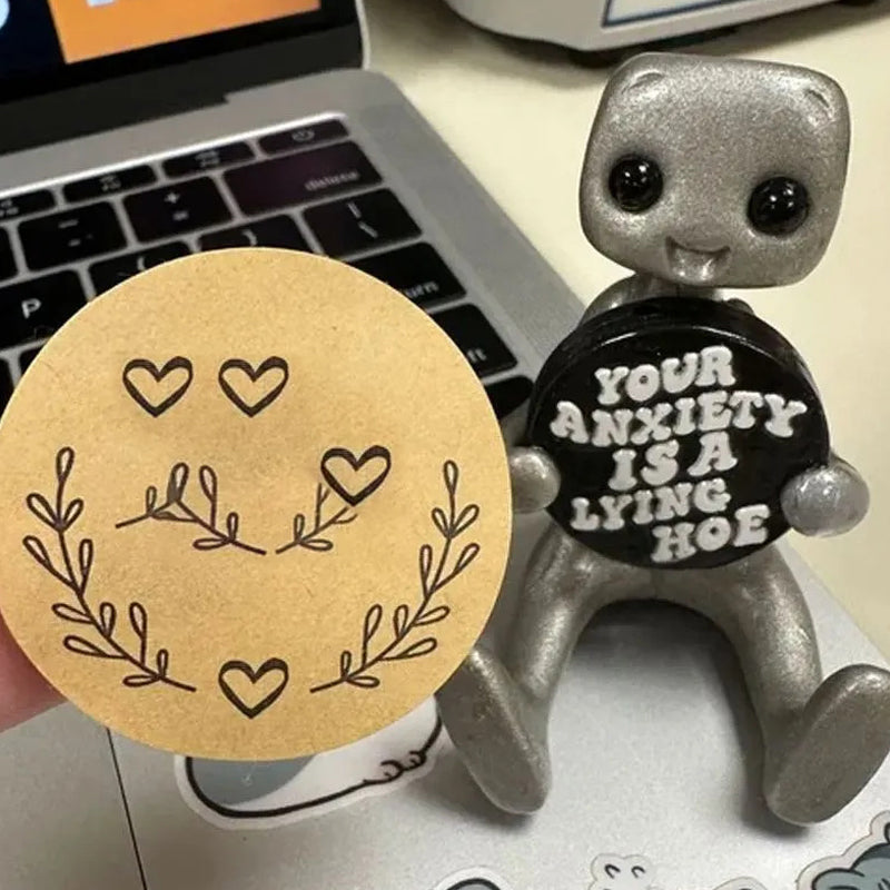 Inspirational desk companion, a robot figurine crafted for mental health support
