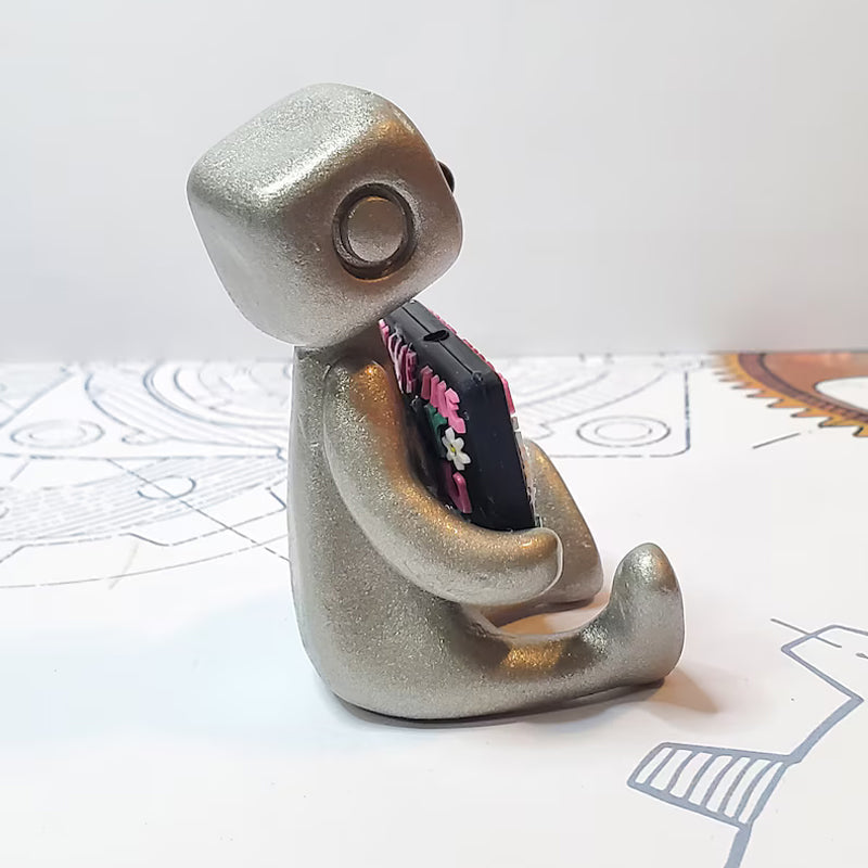 Wellness desk accessory, a durable resin robot companion for daily inspiration