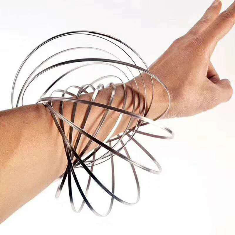 Lifestyle image of a unisex spinning spiral fidget bracelet being worn during a calm moment.