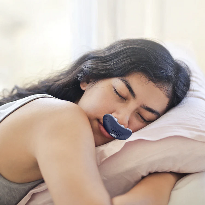 Ergonomic micro CPAP device providing comfortable, hoseless sleep apnea & snoring relief. Promotes better breathing.