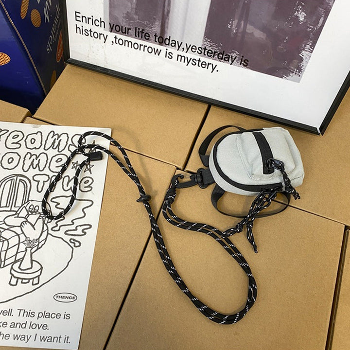 Compact crossbody mini bag, ideal for men and women's daily utility.