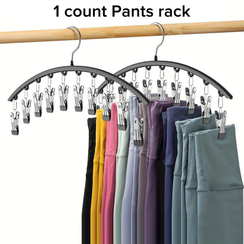 Multifunctional stainless steel hanger for pants, skirts, and shirts; ideal for compact storage solutions.