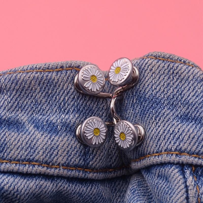 Detail shot of pin and buckle from the no-sew instant waist tightener set, durable metal design