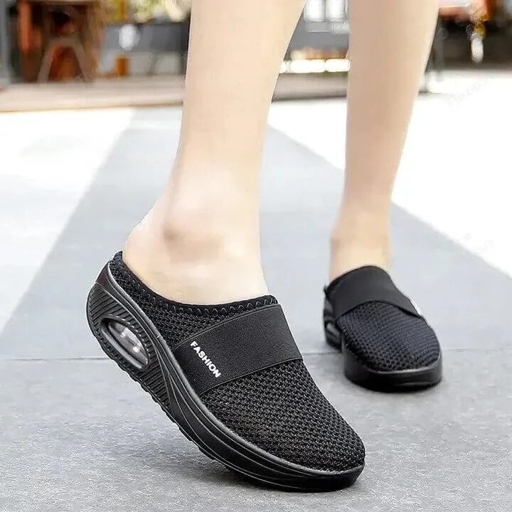Comfortable unisex house shoes with orthopedic support. Ideal for indoor/outdoor wear, breathable for all-day comfort.