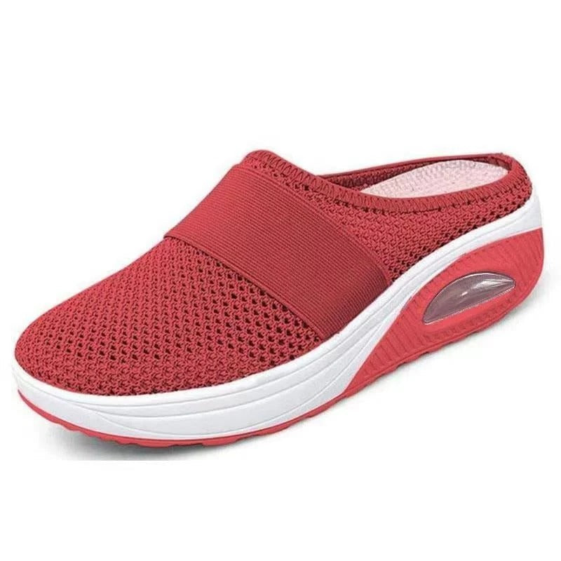 Orthopedic support slippers for foot pain relief. Unisex ergonomic design offers daily comfort and lightweight wear.