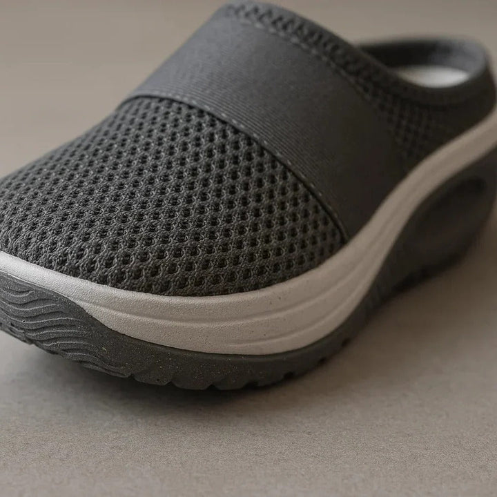 Ergonomic orthopedic sole for daily support. Unisex comfort slippers designed for foot pain relief and lightweight wear.