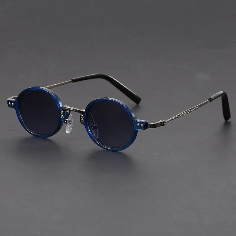 Fashionable blue oval vintage sunglasses, a unisex accessory offering precision vision and style.