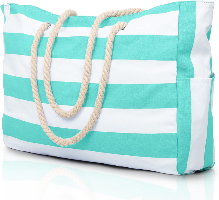 Oversized sandproof tote, your go-to bag for a relaxing day by the water.