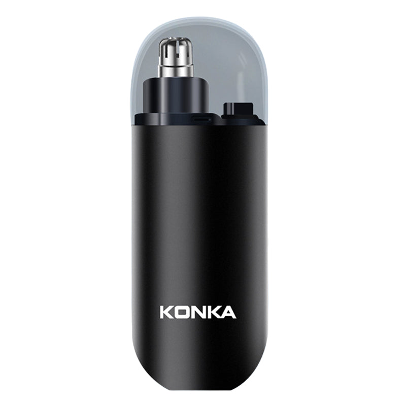 Painless electric nose hair trimmer, compact, travel-friendly, next to a grooming kit