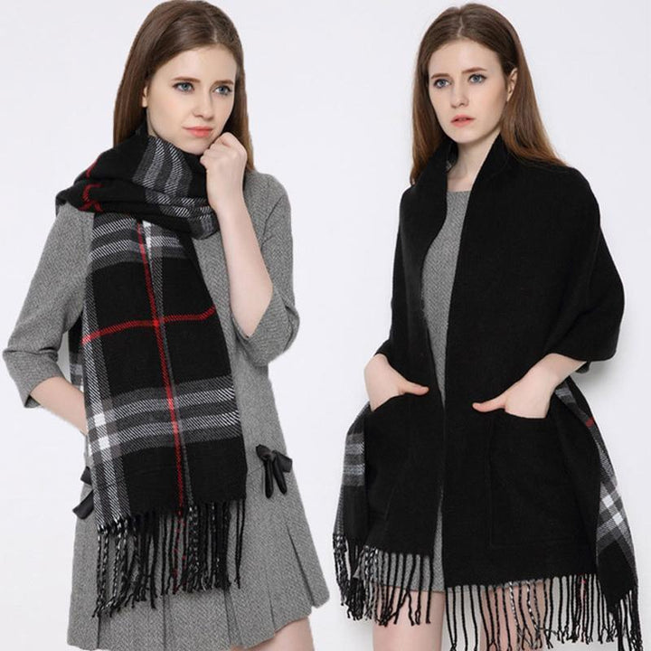 Unisex plaid wrap shawl draped over a model, highlighting its oversized and comfortable design with pockets