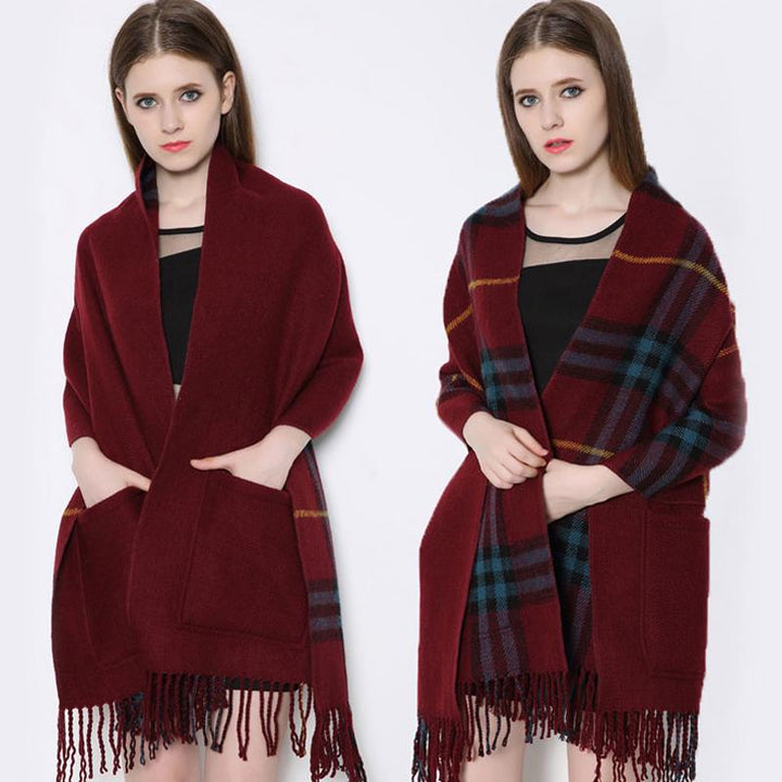 Detail of the plaid pattern and the large pocket on a warm unisex wrap shawl, fall accessory