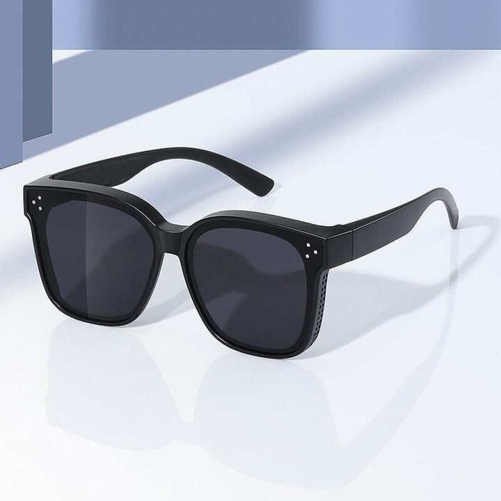 Unisex driving sunglasses, polarized and fitover style, offering superior eye protection