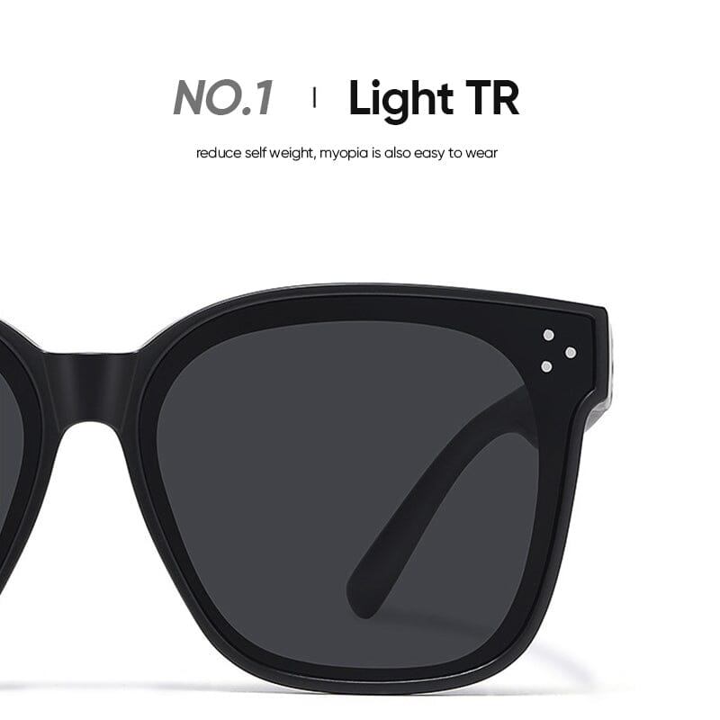 Side view of black fit over sunglasses, designed to comfortably cover prescription eyewear