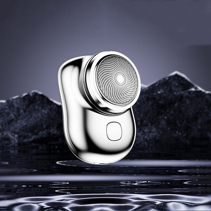 Compact handheld mini shaver with USB charging for men and women's personal care