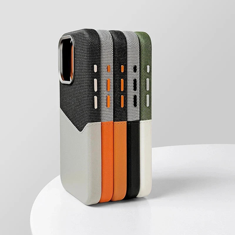 Unisex leather card case on a table next to a phone, emphasizing its slim profile and accessory appeal.