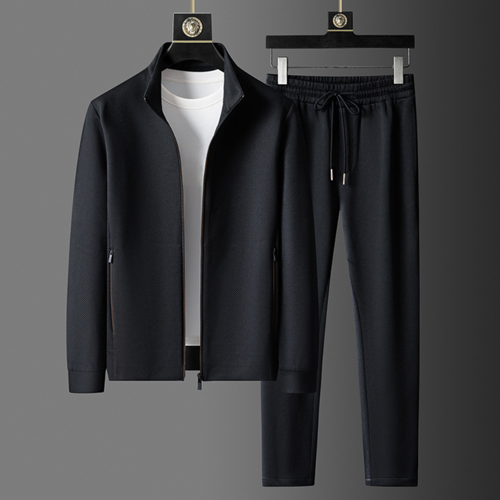 Relaxed fit unisex tracksuit, perfect loungewear & versatile two-piece for spring/fall everyday comfort.