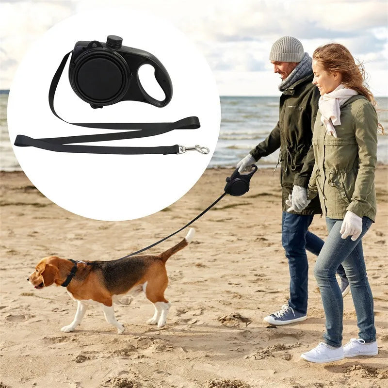 Close-up of a black retractable dog leash with ergonomic handle, pet supplies