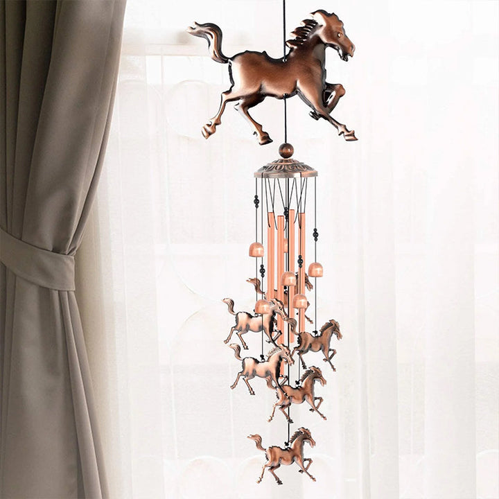 Close-up of bronze animal figures on a retro wind chime, intricate details, ideal outdoor decor