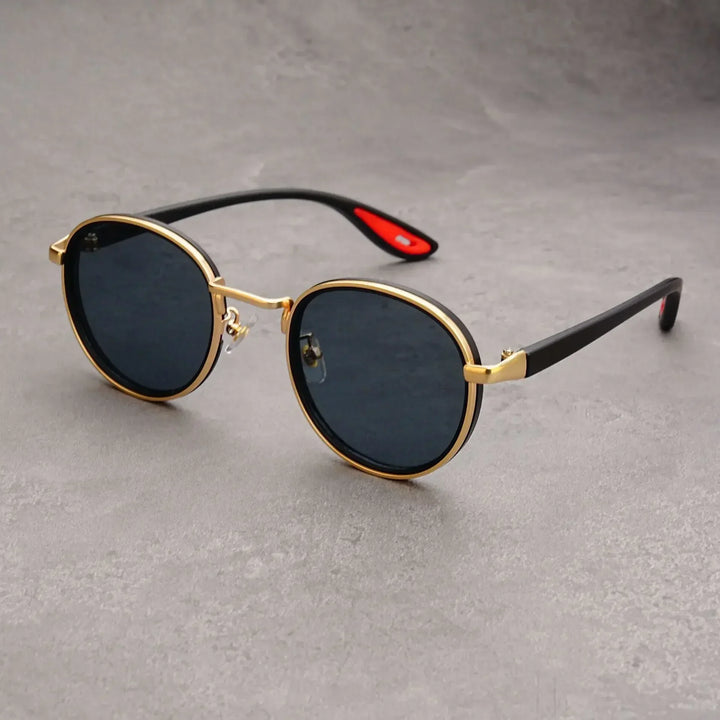 Close-up of vintage-style round metal sunglasses, a fashionable unisex eyewear accessory