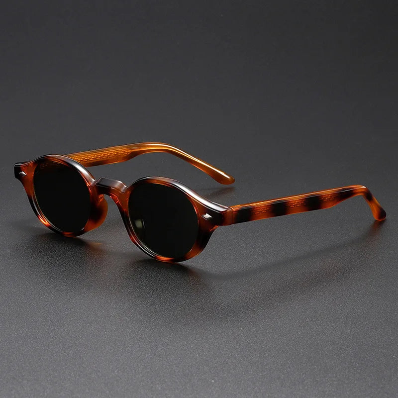Pair of retro round sunglasses for men and women, amber frames, offering UV protection.
