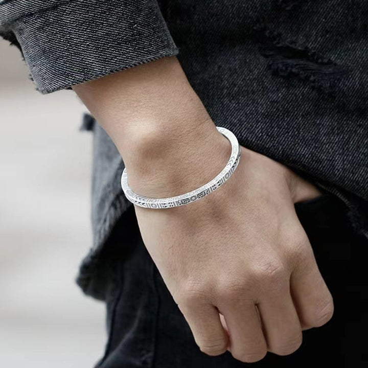 Retro totem ethnic bangle bracelet worn on a wrist, showcasing its adjustable copper design