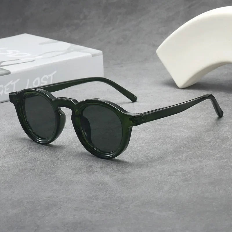 Comfortable unisex round eyewear with scratch-resistant tinted lenses.