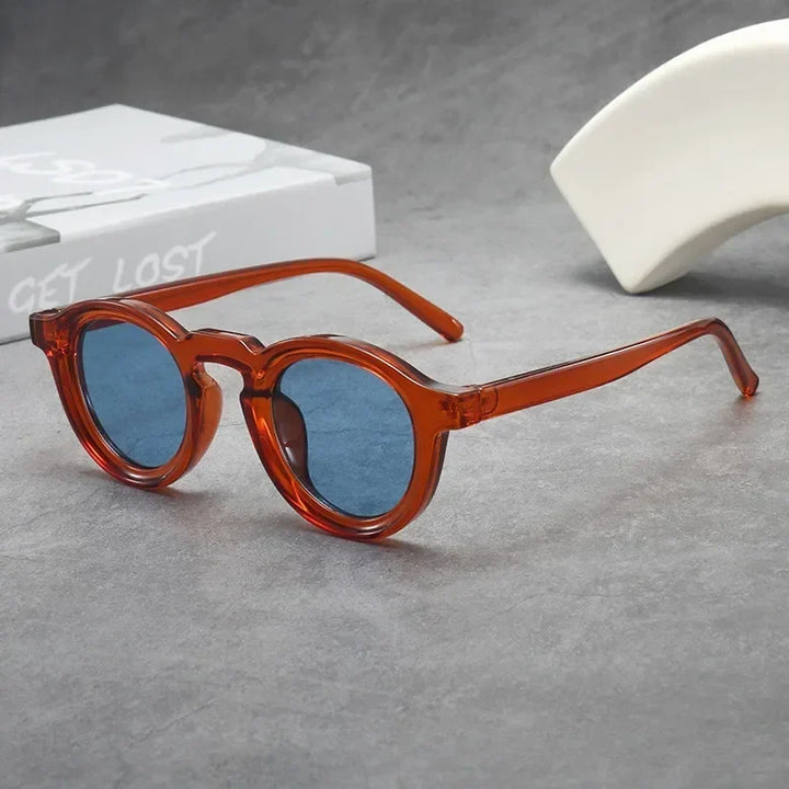 Unisex round sunglasses with tinted lenses, ideal for daily style.