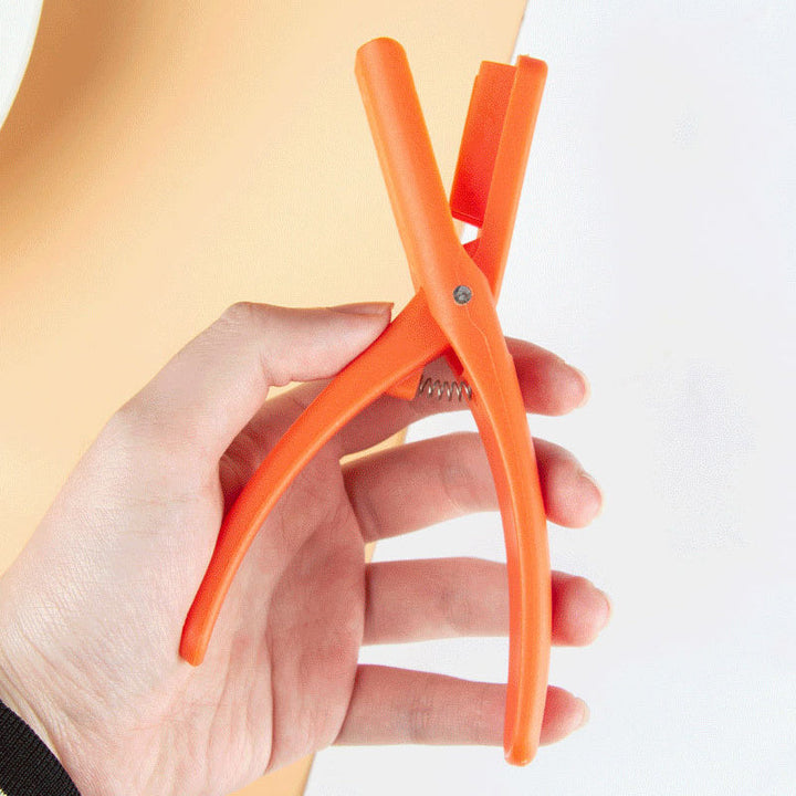 Seafood Sheller Tool, red plastic, designed for efficient crawfish and seafood preparation