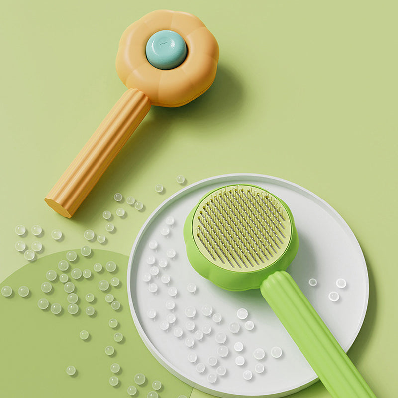 Cat being groomed with a Self-Cleaning Pet Brush, showcasing gentle and efficient pet hair removal