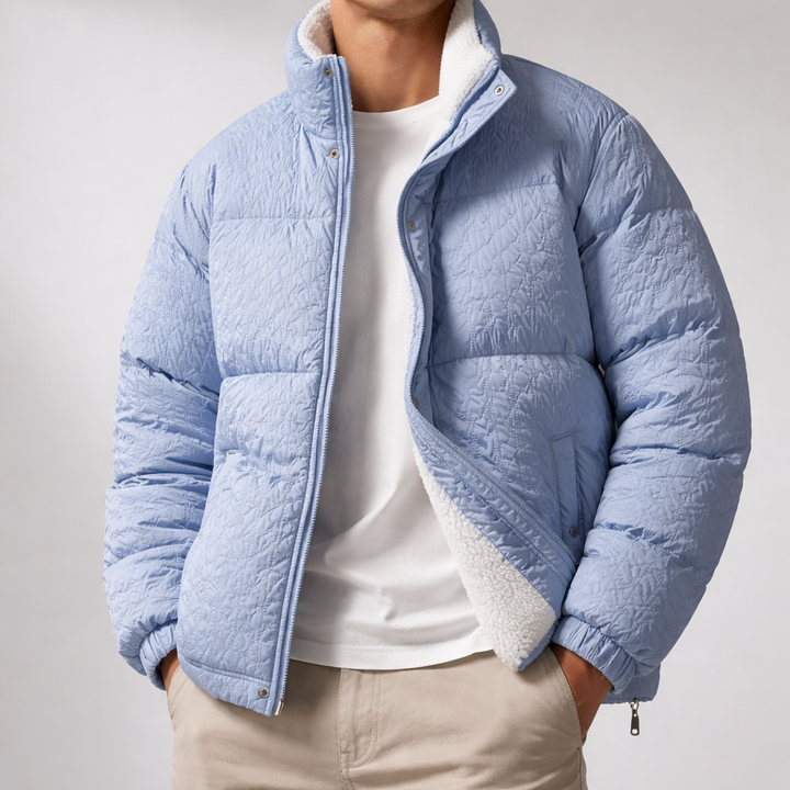 Unisex Sherpa Puffer Jacket in black, front view, warm and stylish with quilted exterior