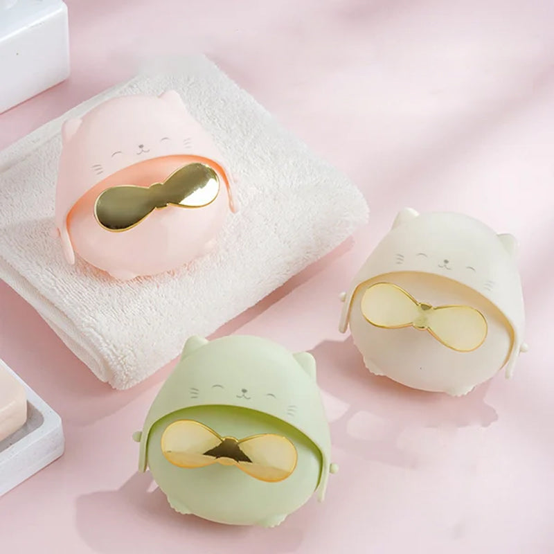 Unisex black scalp massager with easy-grip handle, perfect for improving hair and scalp health.