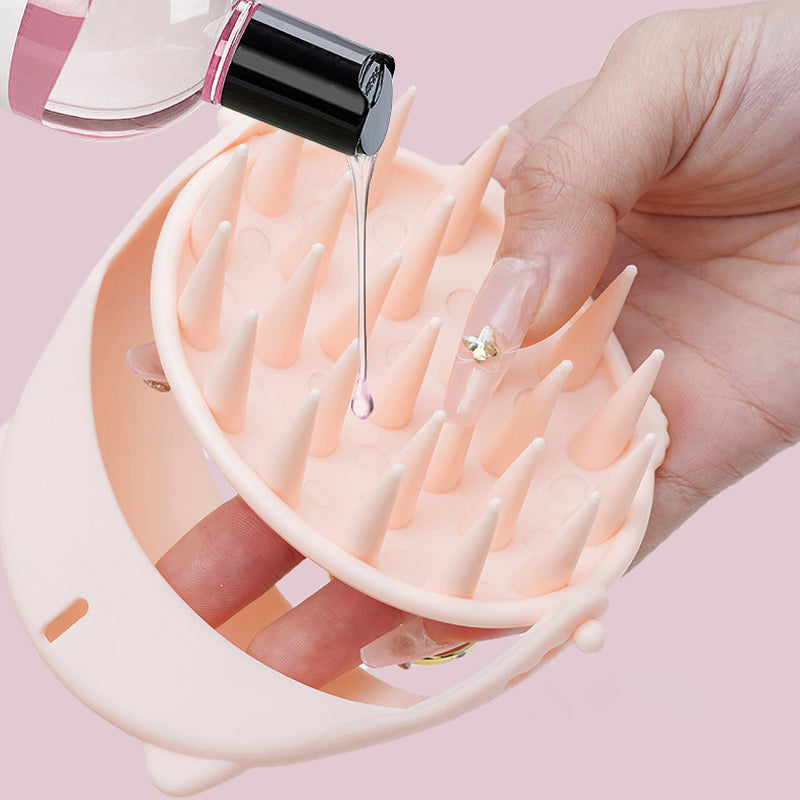 Scalp massager used during shampooing, illustrating its deep cleaning and stimulating benefits.