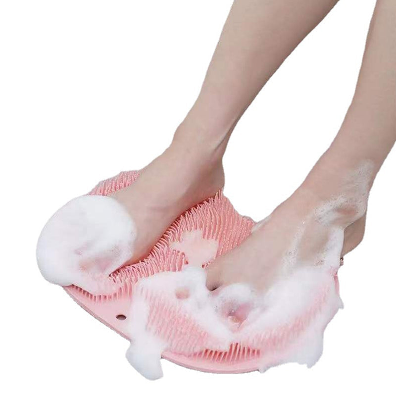 Shower relaxation aid: soft silicone foot scrubber and back brush in a refreshing color