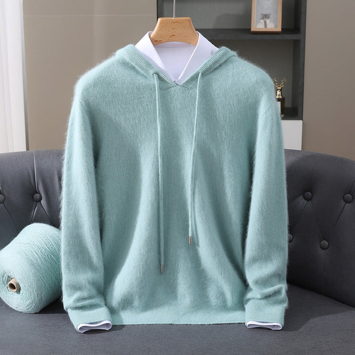 Detail of the spacious hood and front pocket on a relaxed soft-touch loungewear pullover.