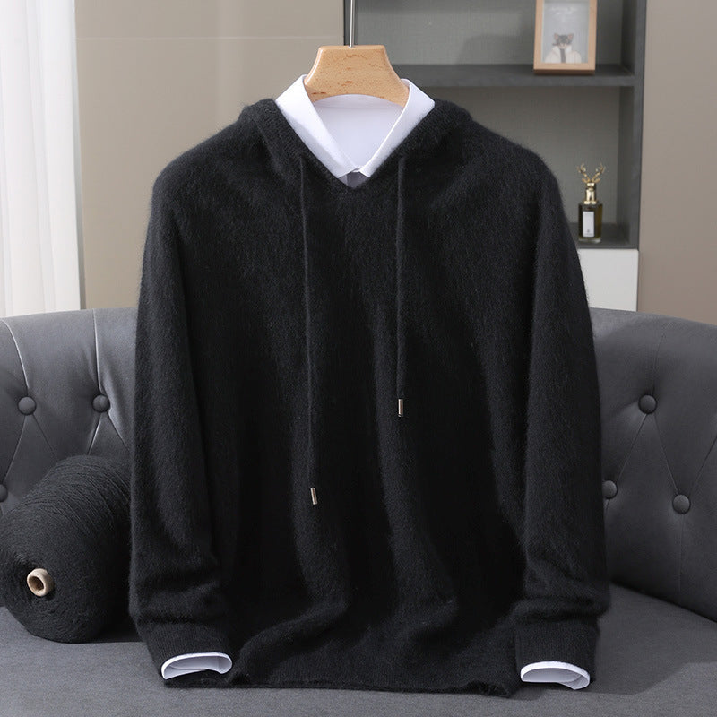 Person enjoying the cozy feel of a versatile pullover hoodie, perfect for comfort & loungewear.