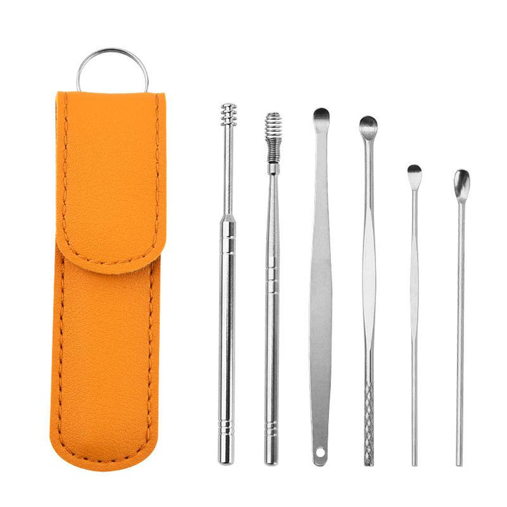 An organized display of all the tools in the stainless steel earwax removal kit for ear health