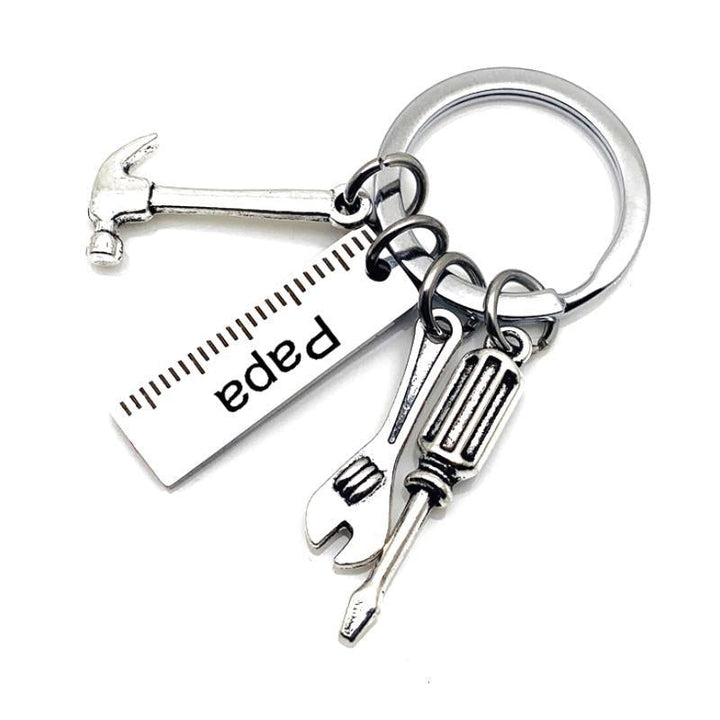 Unisex keychain in polished stainless steel, featuring a laser-engraved message for dad.